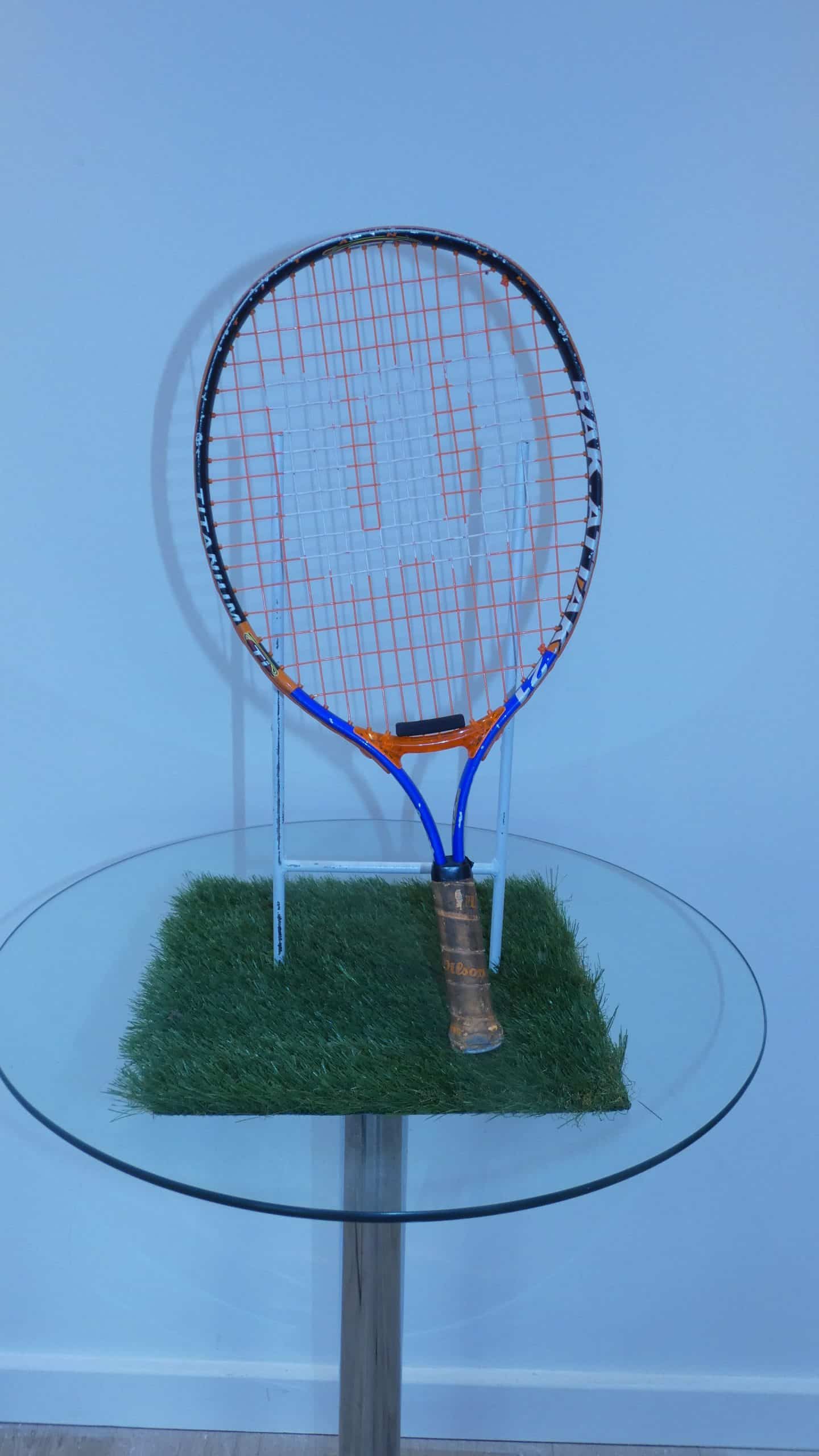 Wilson Tennis Racquet 21 inches long, grip 3 1/2 inches.