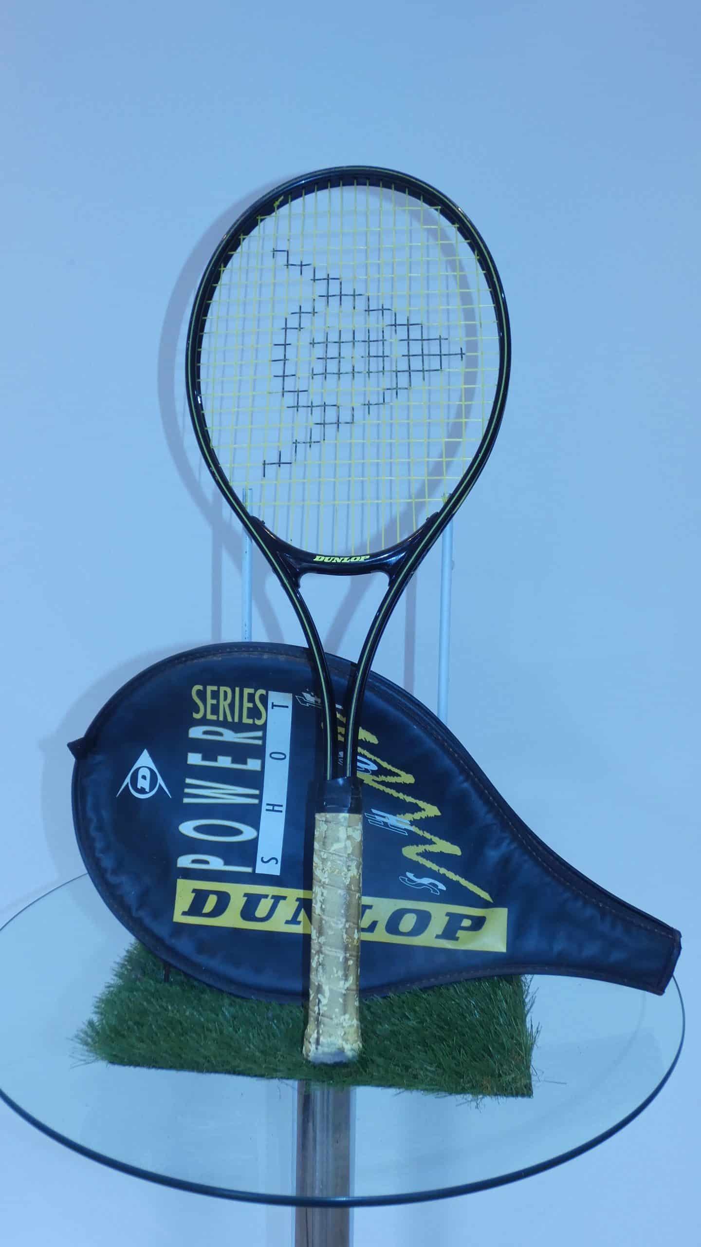 Dunlop Tennis Racquet with Cover, 27 inches in length, grip 4 1/2 inches, size 4.