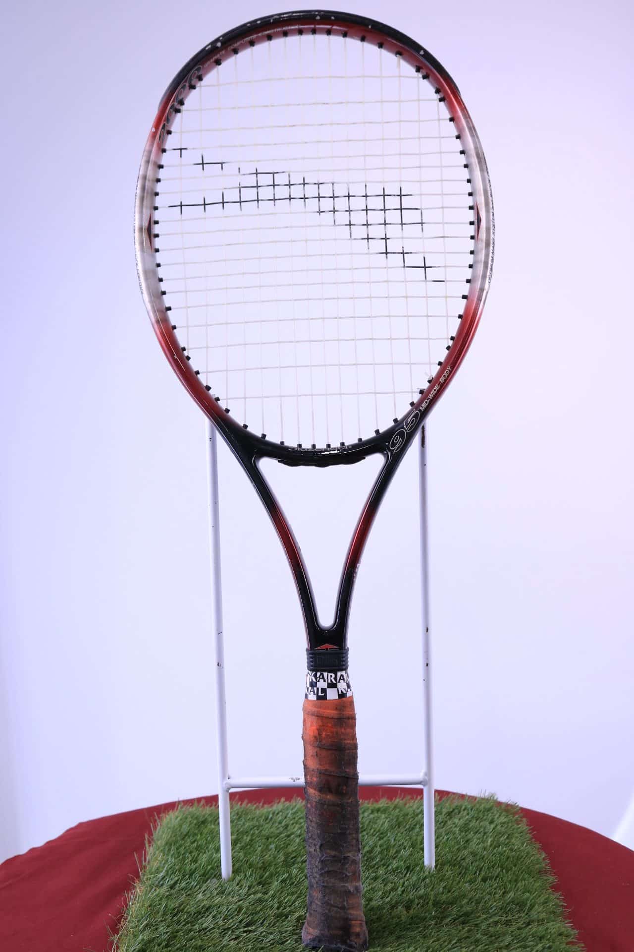 Slazenger Tennis Racquet 27 inches in length, grip 4 5/8 inches size 5
